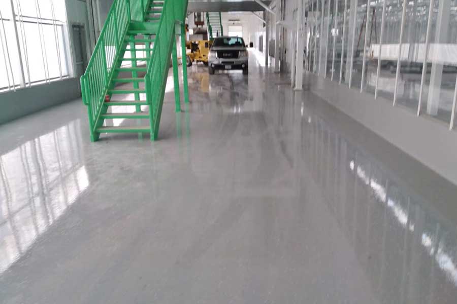 Urethane top coat over epoxy for a long lasting concrete floor, Warehouse Facility