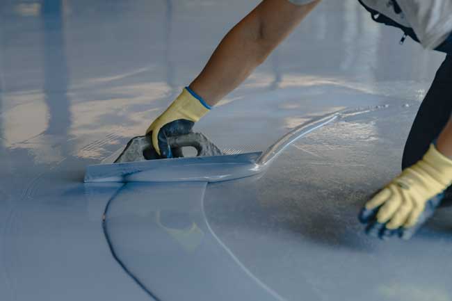 Self leveling cement for leveling of concrete floors.