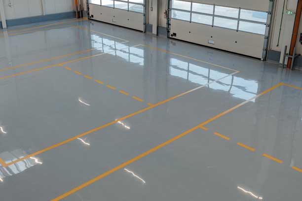 Floor Leveling for smooth epoxy flooring Kitchener, Waterloo and Cambridge.